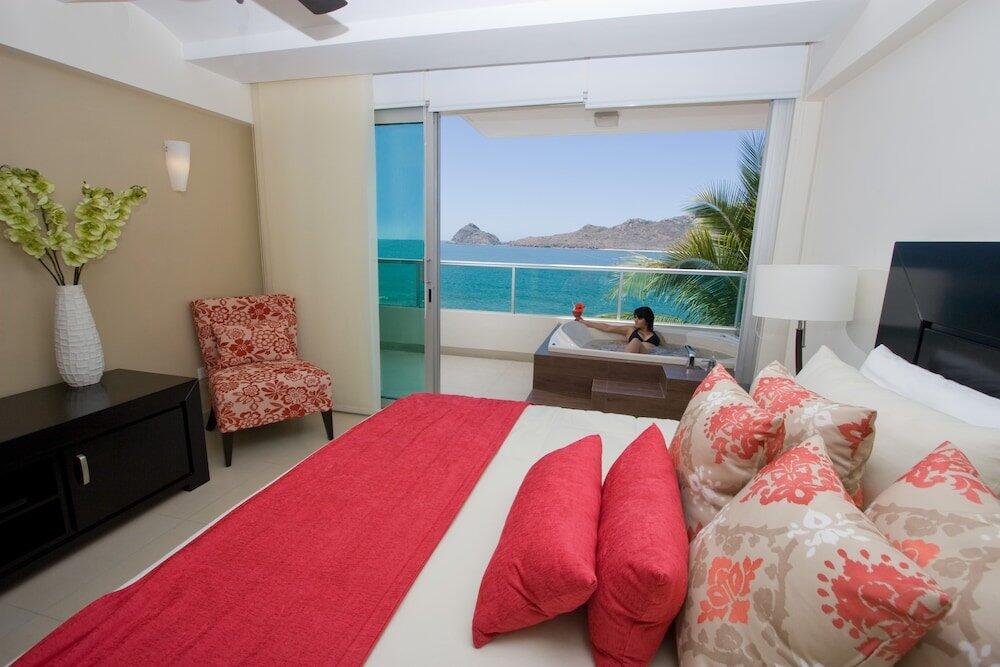 Foto de una habitación de Hotel Las Flores Beach Resort