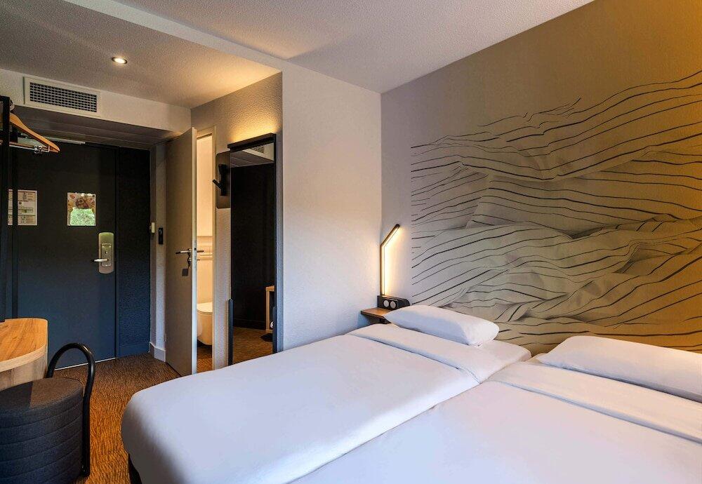Foto de una habitación de Hotel Première Classe Cholet