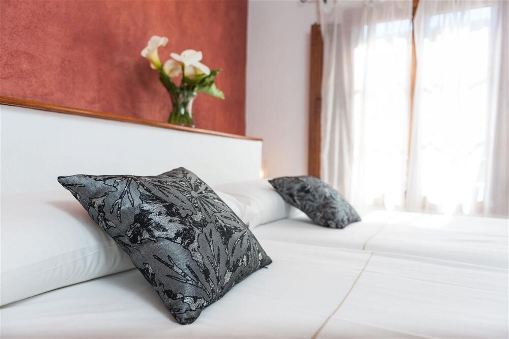 Foto de una habitación de Hotel Can Simo