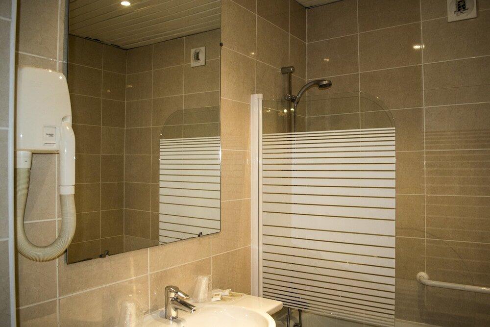 Foto del baño de Hotel Touring