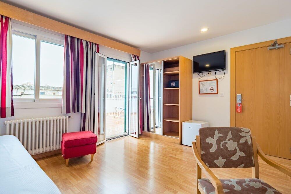 Foto de una habitación de Hotel Amic Colón