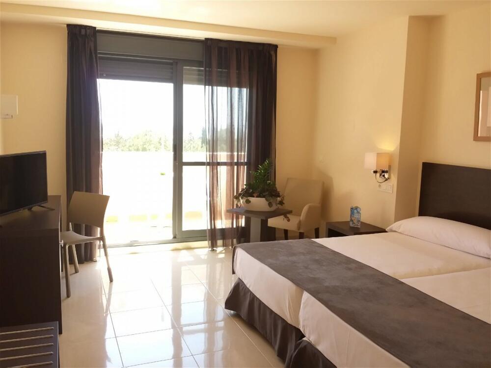 Foto de una habitación de Hotel Adaria Vera