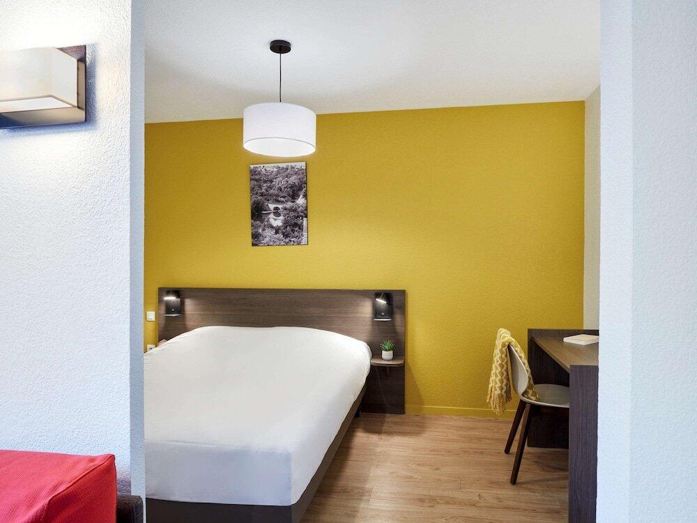 Foto de una habitación de Aparthotel Adagio Access Poitiers