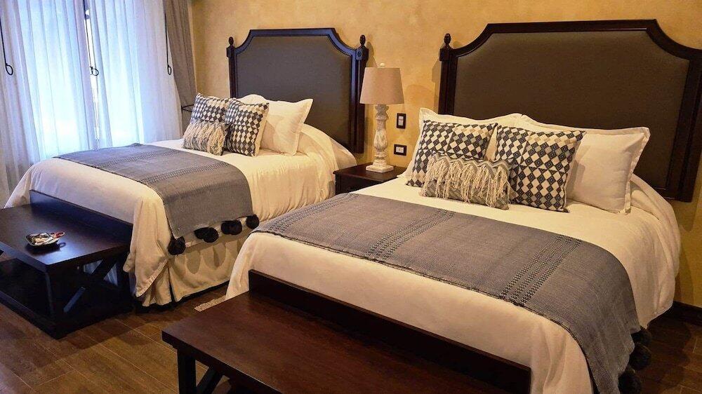 Foto de una habitación de Hotel Boutique Los Pasos &amp;amp; Spa