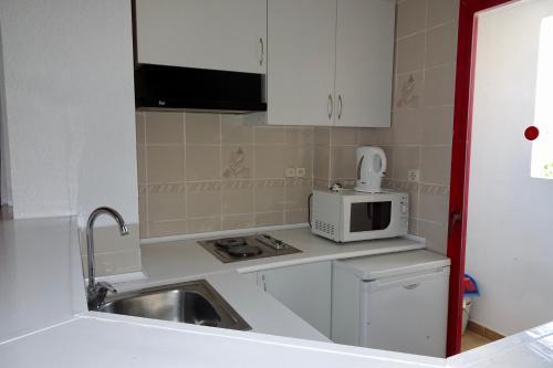 Foto de una habitación de Evamar Apartments