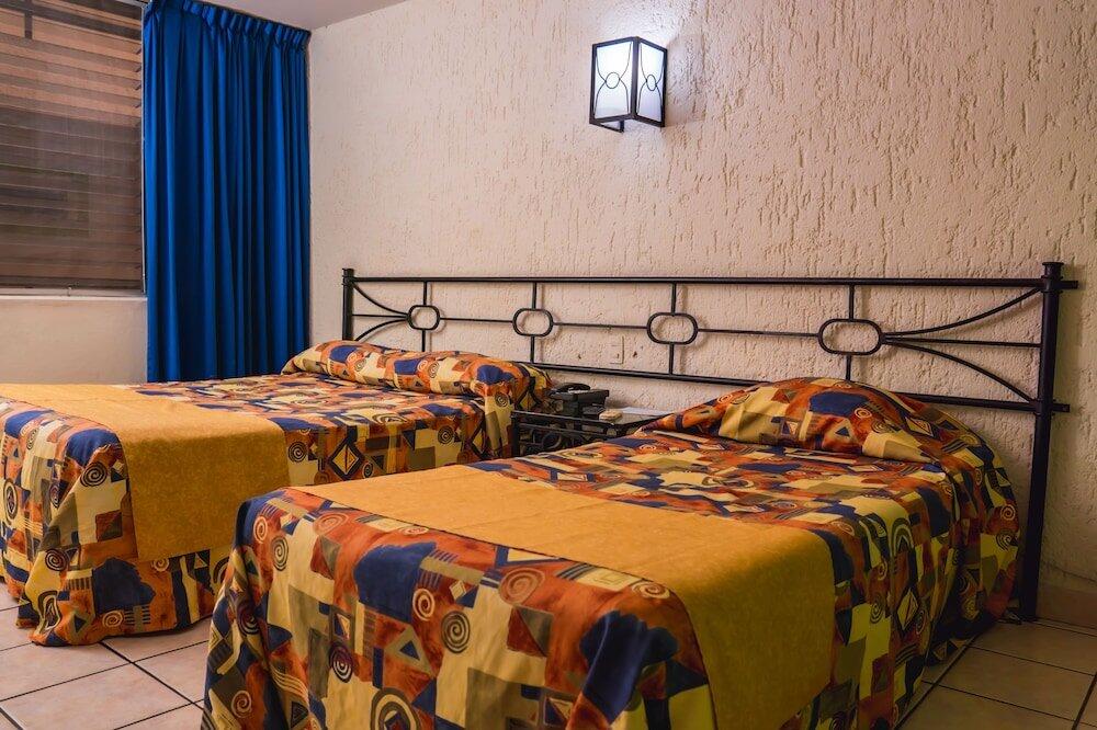 Foto de una habitación de Hotel Arboledas Expo