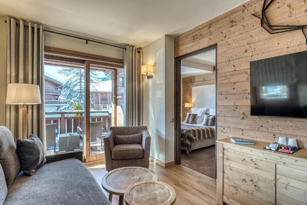 Foto de una habitación de Hotel Les Loges Blanches