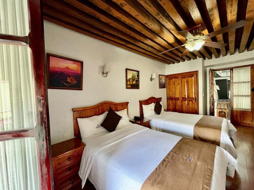 Foto de una habitación de Hotel Puebla Plaza