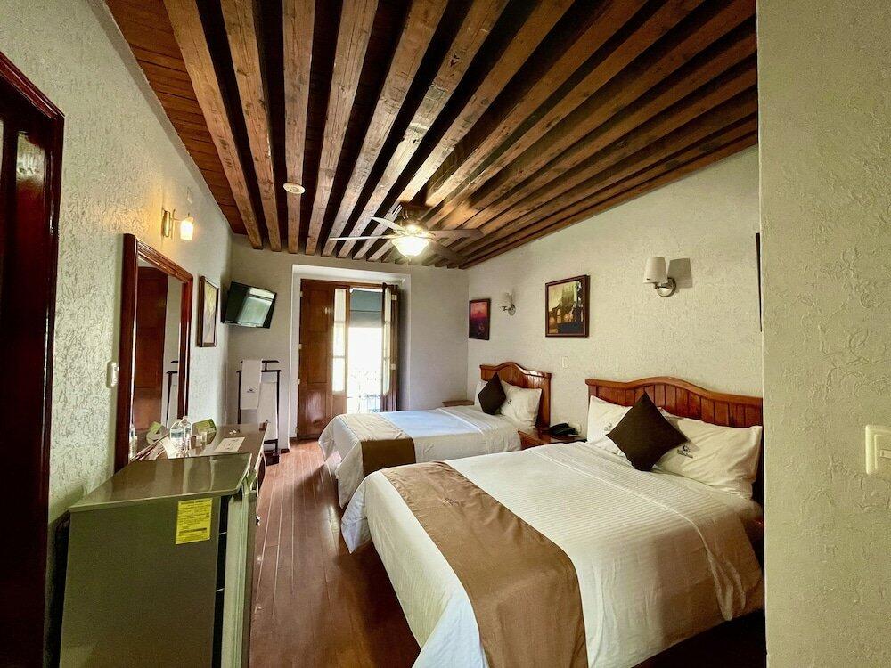 Foto de una habitación de Hotel Puebla Plaza