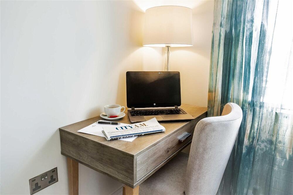 Foto de una habitación de Astor Court Hotel