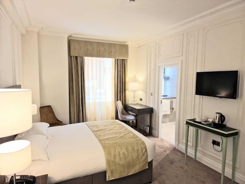 Foto de una habitación de Astor Court Hotel