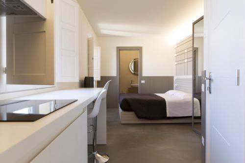 Room – Aparthotel Palazzo dei Ciompi Suites