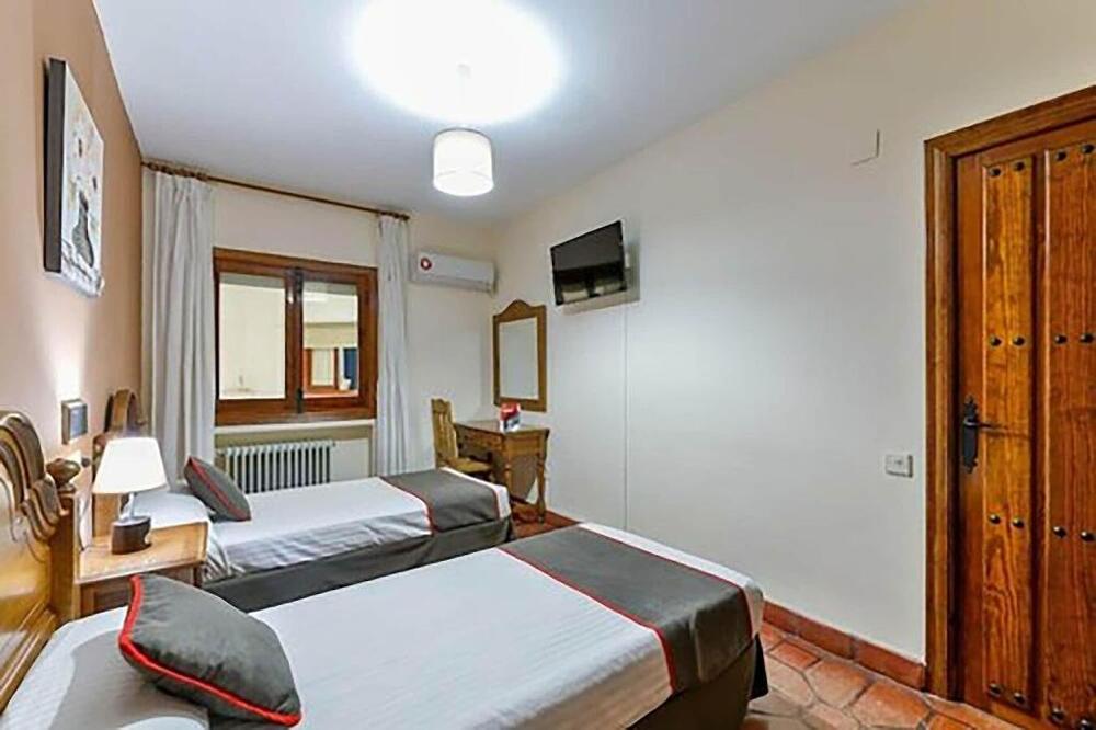 Foto de una habitación de Hostal Alfonso XI