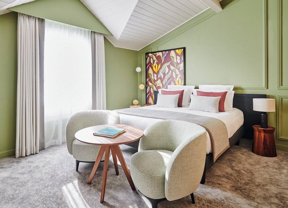Foto de una habitación de Château Hôtel Grand Barrail