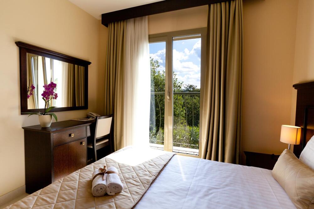 Foto de una habitación de Hotel Blue Waves Resort
