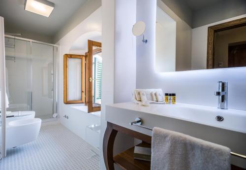 Foto del baño de Hotel Palazzo Leopoldo Dimora Storica &amp;amp; Spa