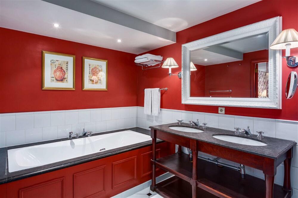 Foto del baño de Hotel NH Brugge