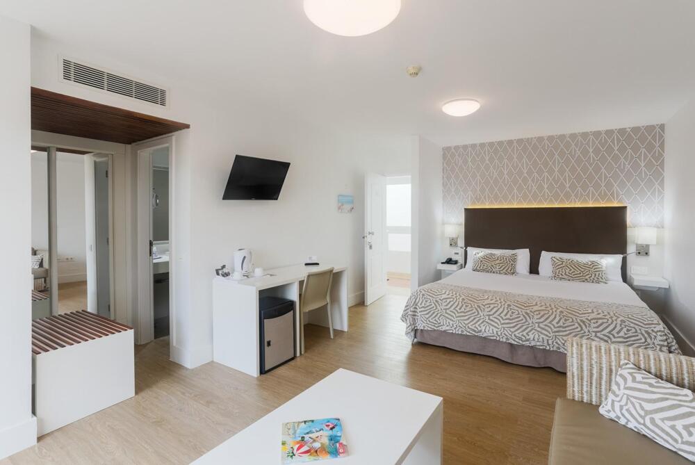 Foto de una habitación de Arena Suite Hotel
