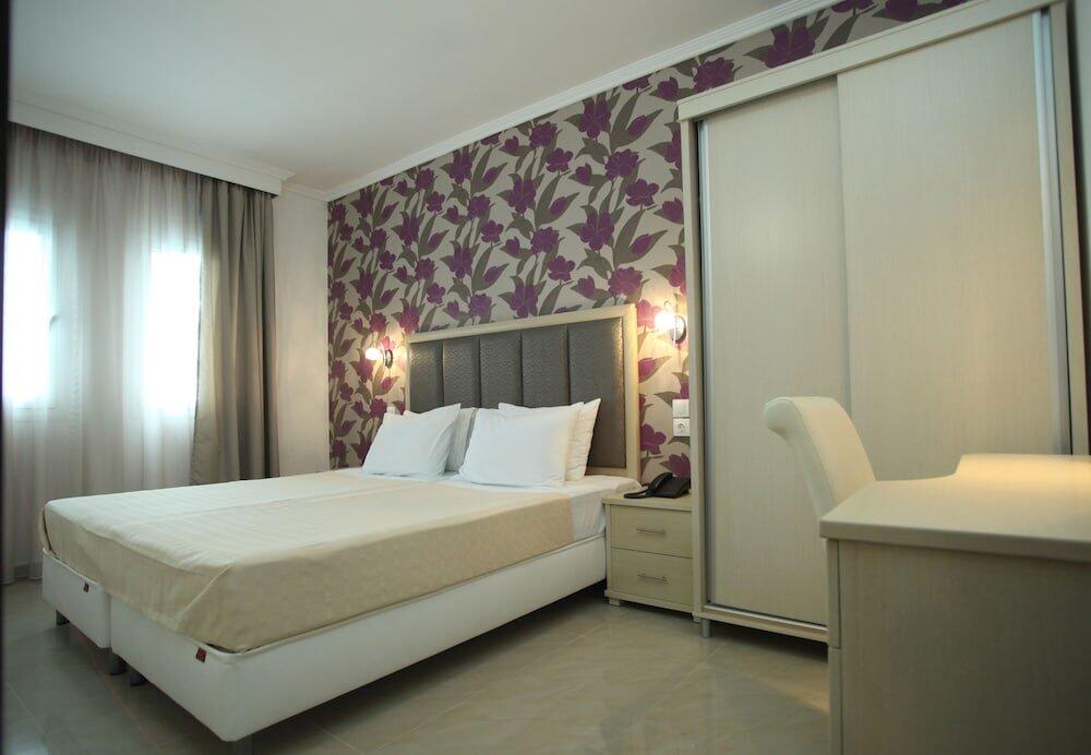 Foto de una habitación de Naias Beach Hotel