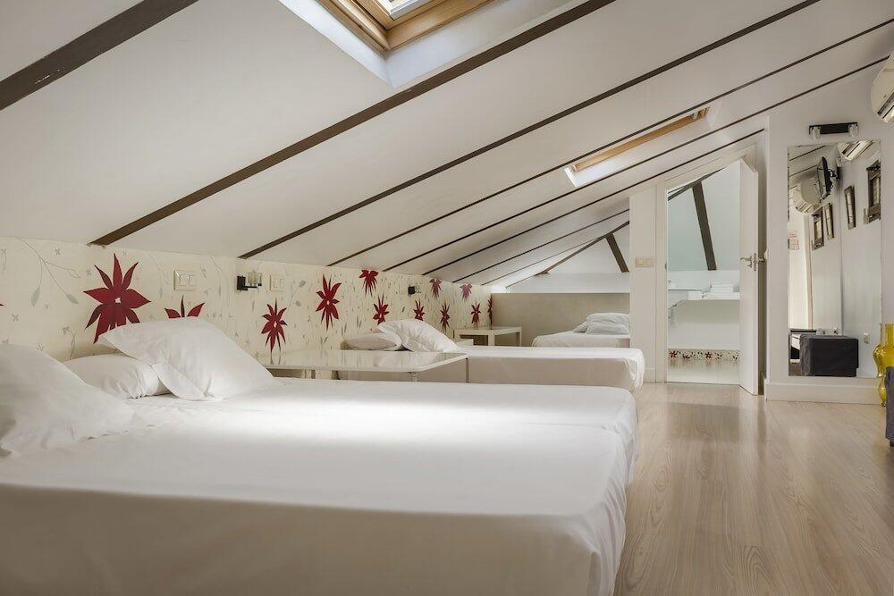 Foto de una habitación de Hostal YIT Puerta Bisagra
