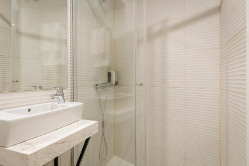 Foto del baño de Hostal YIT Puerta Bisagra