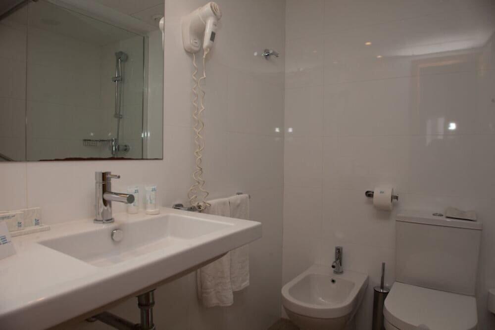 Foto del baño de Aparthotel Acuazul