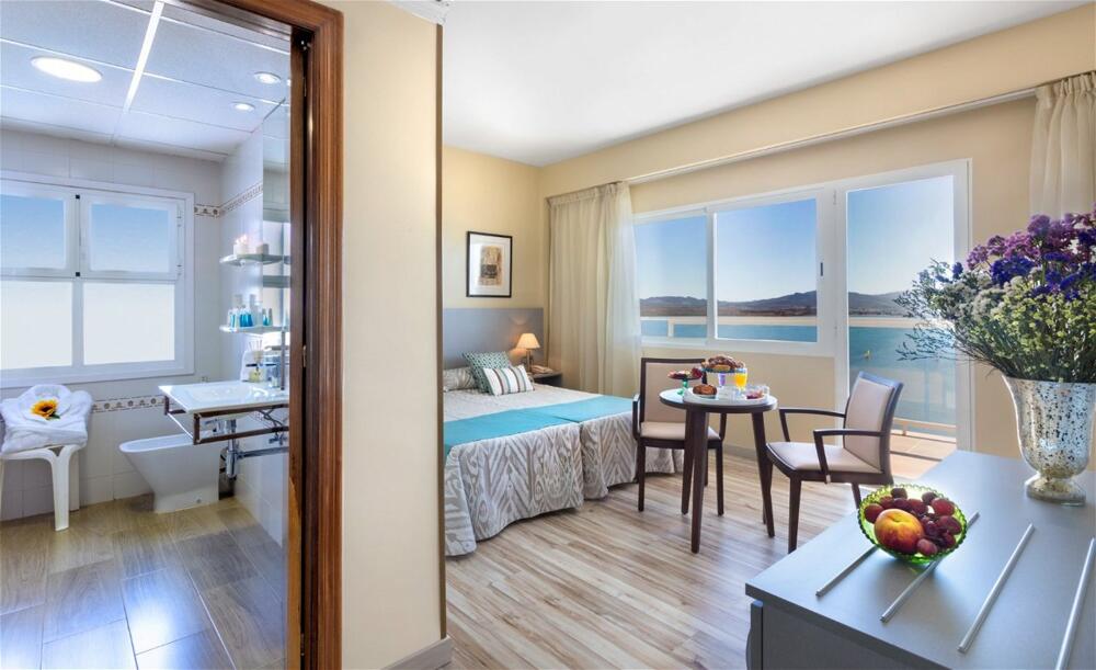 Foto de una habitación de Hotel Izán Cavanna