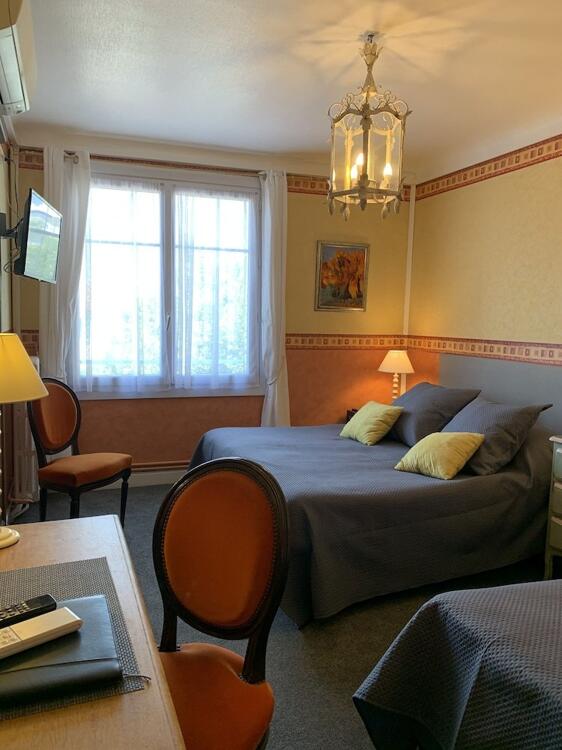Foto de una habitación de Hôtel Le Pré Catelan