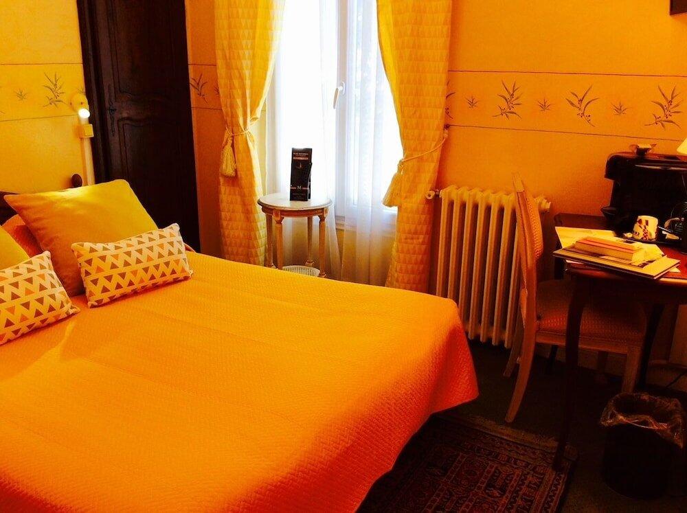 Foto de una habitación de Hôtel Le Pré Catelan