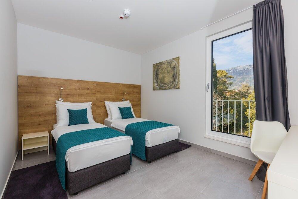 Foto de una habitación de Hotel Stacija
