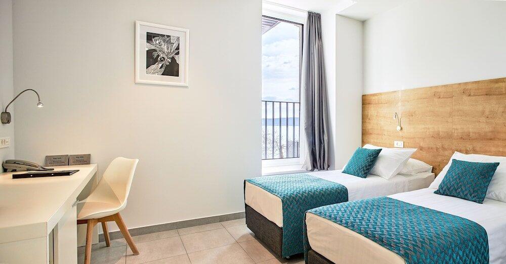Foto de una habitación de Hotel Stacija