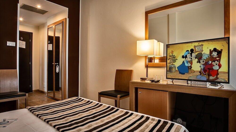 Foto de una habitación de Sardegna Hotel - Suites &amp;amp; Restaurant