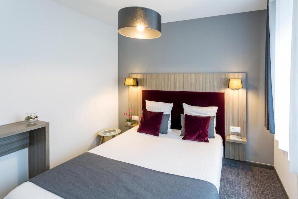 Foto de una habitación de NEMEA Appart Hotel - Résidence Elypséo