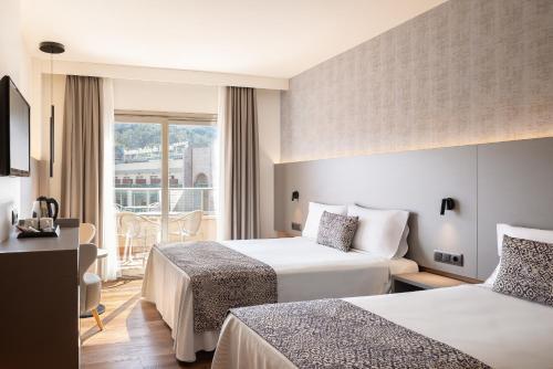 Foto de una habitación de Hotel Golden Bahía de Tossa &amp;amp; Spa 4* Sup.