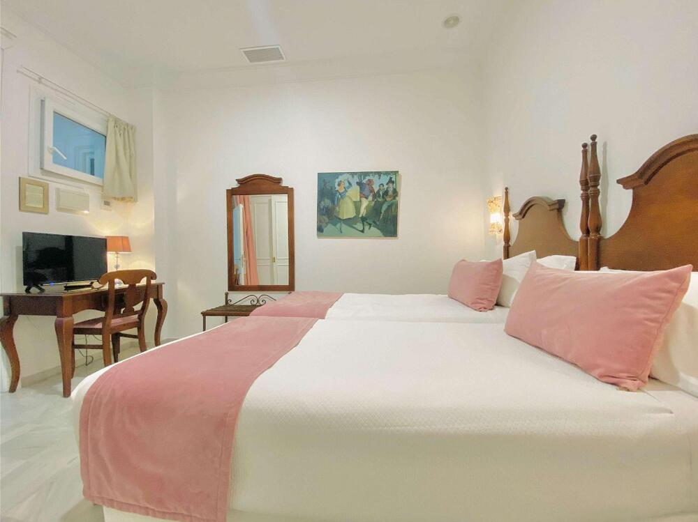 Foto de una habitación de Hotel Las Cortes De Cádiz