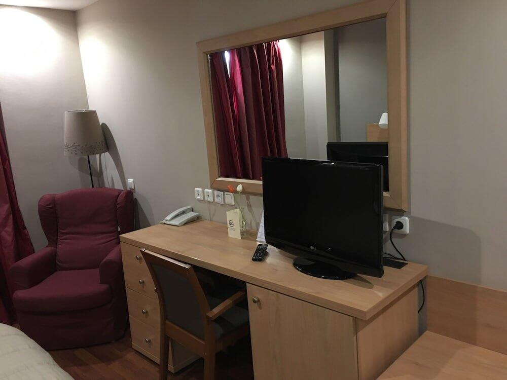 Foto de una habitación de Athina Airport Hotel