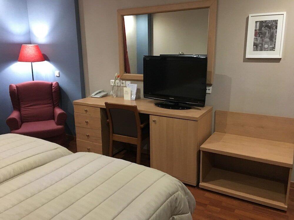 Foto de una habitación de Athina Airport Hotel