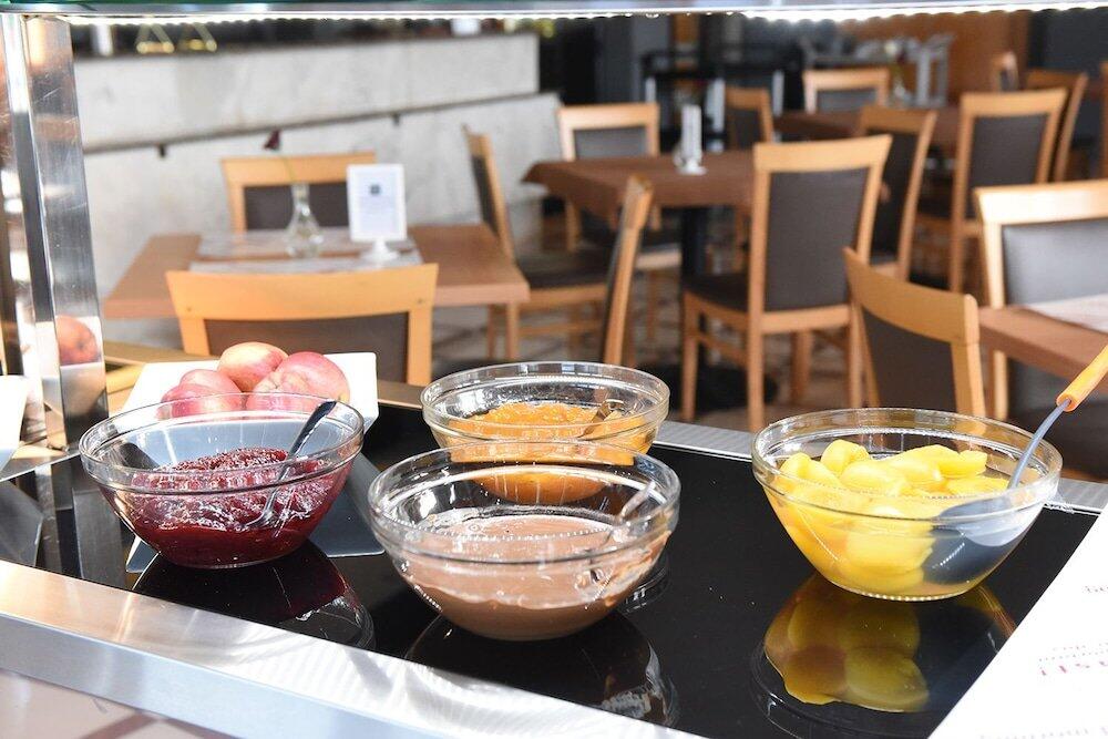 Foto de restauración de Athina Airport Hotel