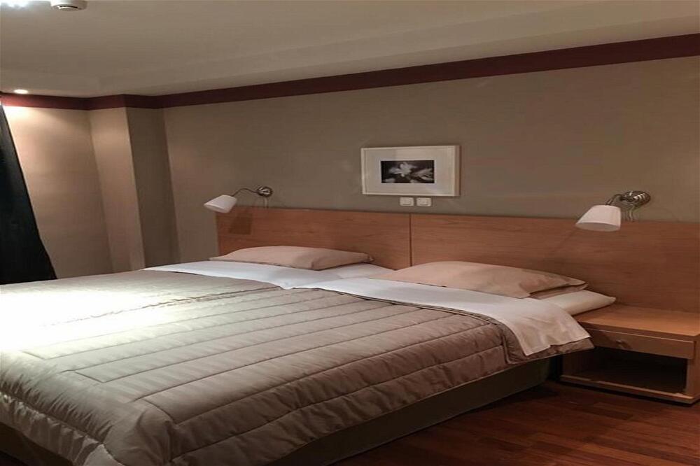 Foto de una habitación de Athina Airport Hotel