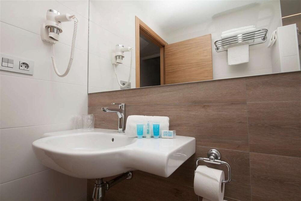 Foto del baño de Hotel Perla