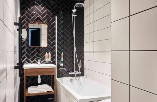 Foto del baño de Hotel Konti by HappyCulture