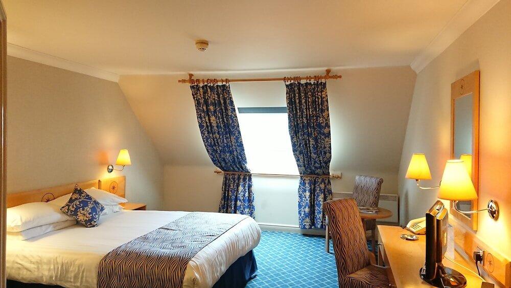 Foto de una habitación de The Queens Hotel