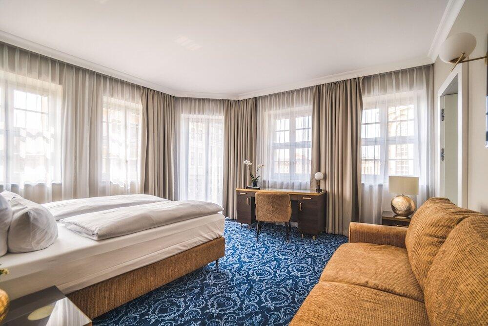 Foto de una habitación de Hotel Suitess