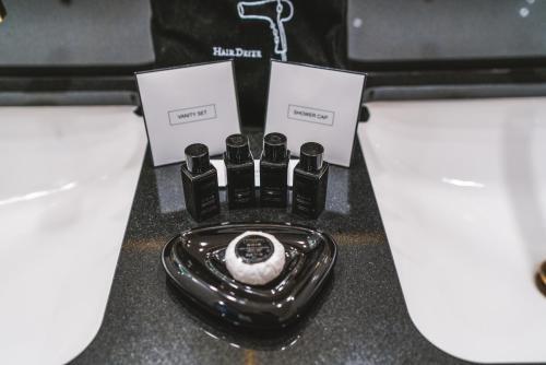 Foto del baño de Hotel Suitess