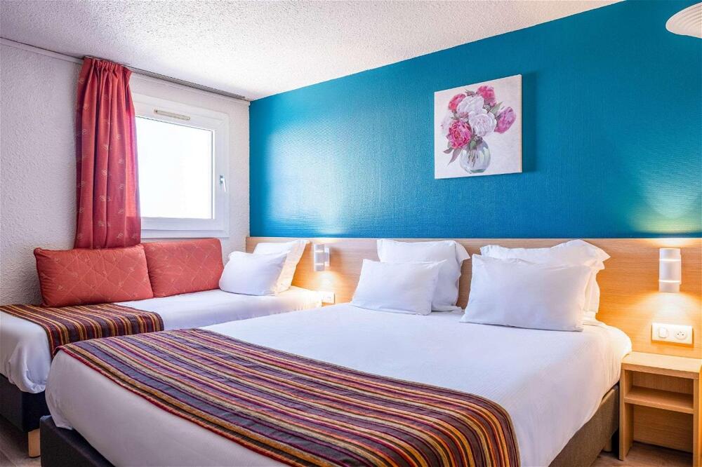 Foto de una habitación de Comfort Hotel Montlucon