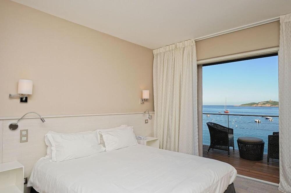 Foto de una habitación de Hotel Le Pinarello