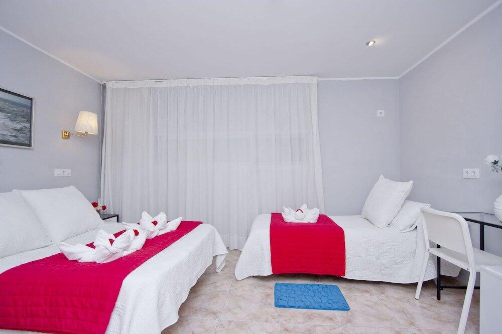 Foto de una habitación de Barcelona City Rooms