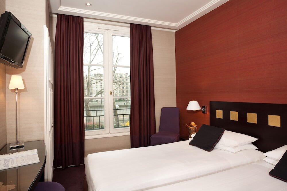 Foto de una habitación de Hotel De La Jatte