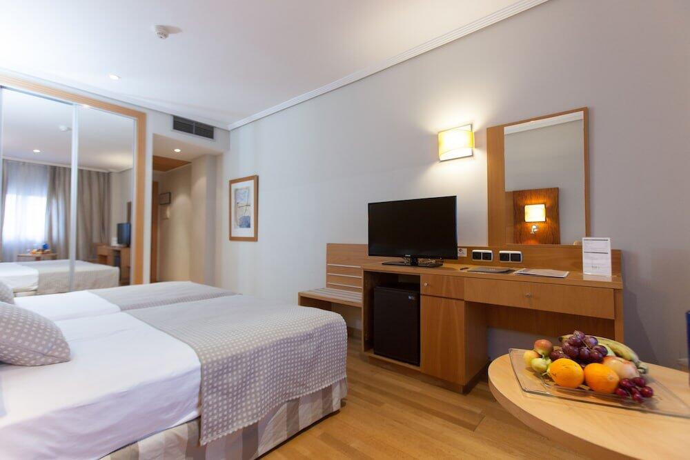 Foto de una habitación de Hotel Sercotel Gran Fama