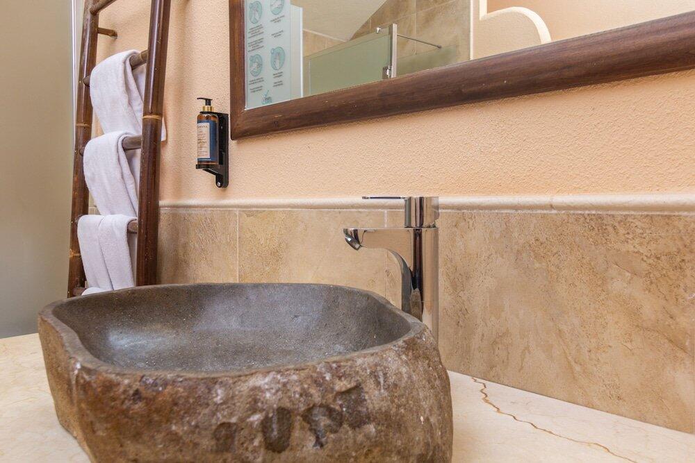 Foto del baño de Zahara Sol Villas y Apartamentos by QHotels